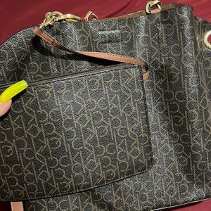 Large leather shoulder bag with cross body strap and wrist wallet